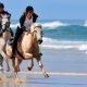 horse riding on the beach